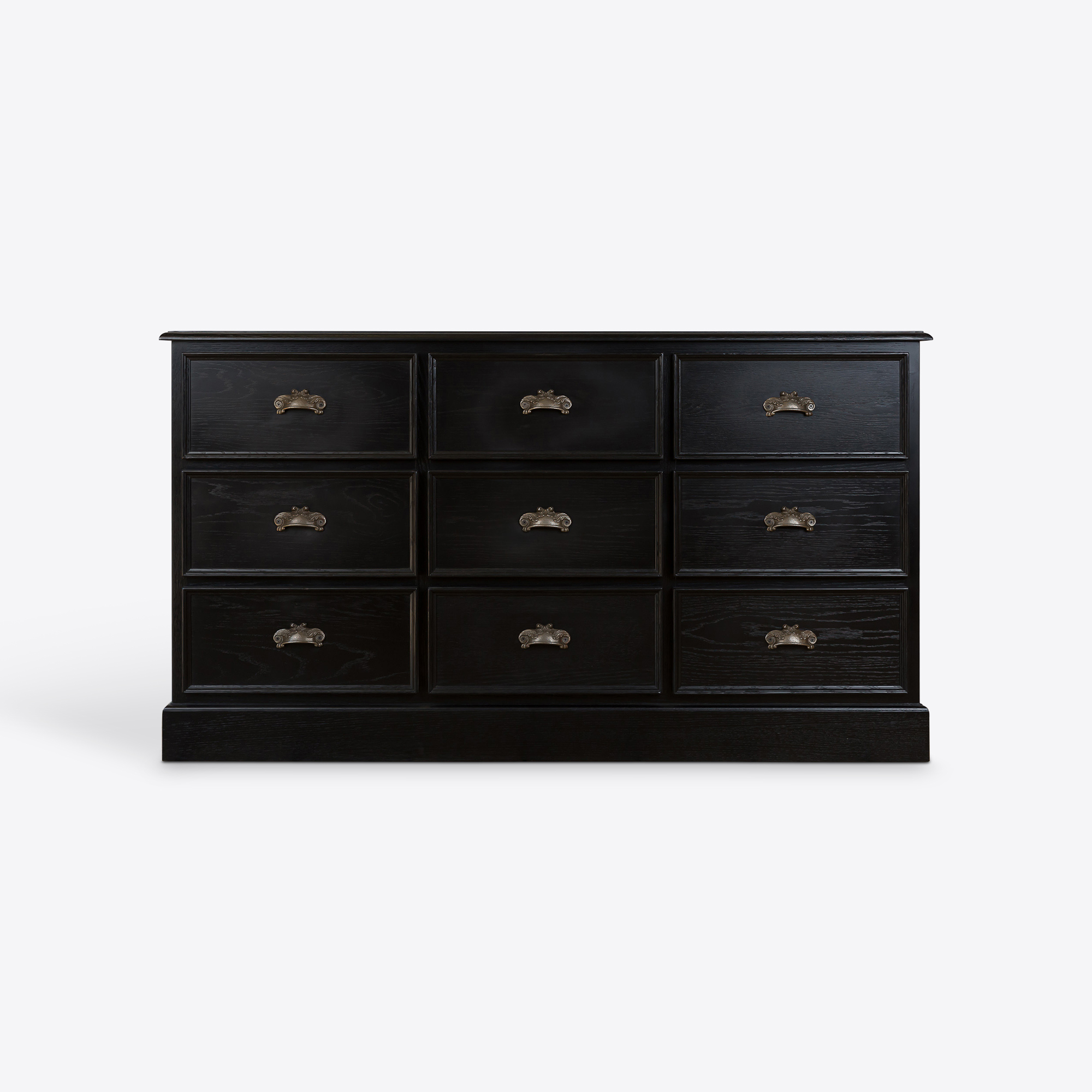 large oak bank of drawers in black