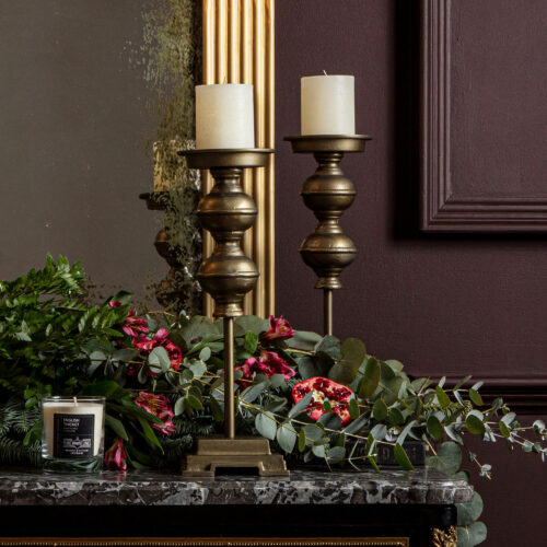 pillar candle holders in antique brass