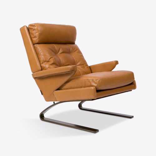 tan brown leather armchair with footstool