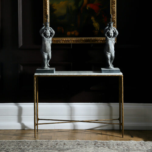 rectangular marble console table with hammered effect brass metalwork