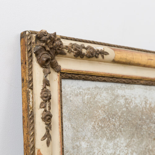 antique French mirror with gilded flowers