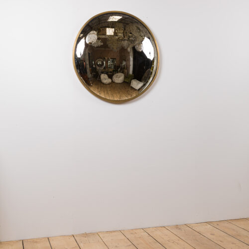 aged glass convex mirror with brass frame