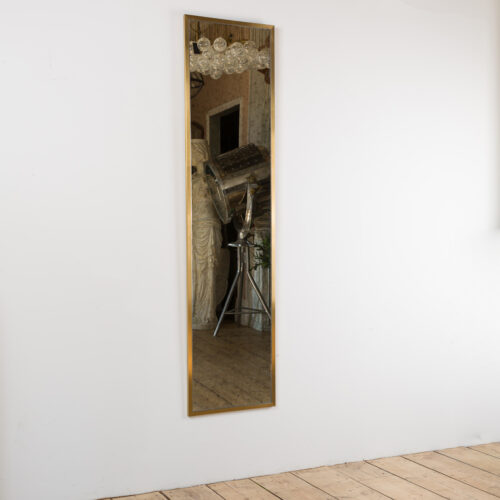 aged dressing mirror with brass frame