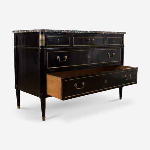 antique French commode with black marble